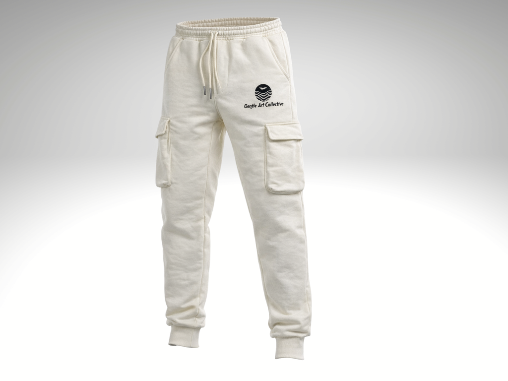 Gentle Art Collective STANCE Ivory joggers displayed on a hanger, showcasing their relaxed fit and soft fabric.