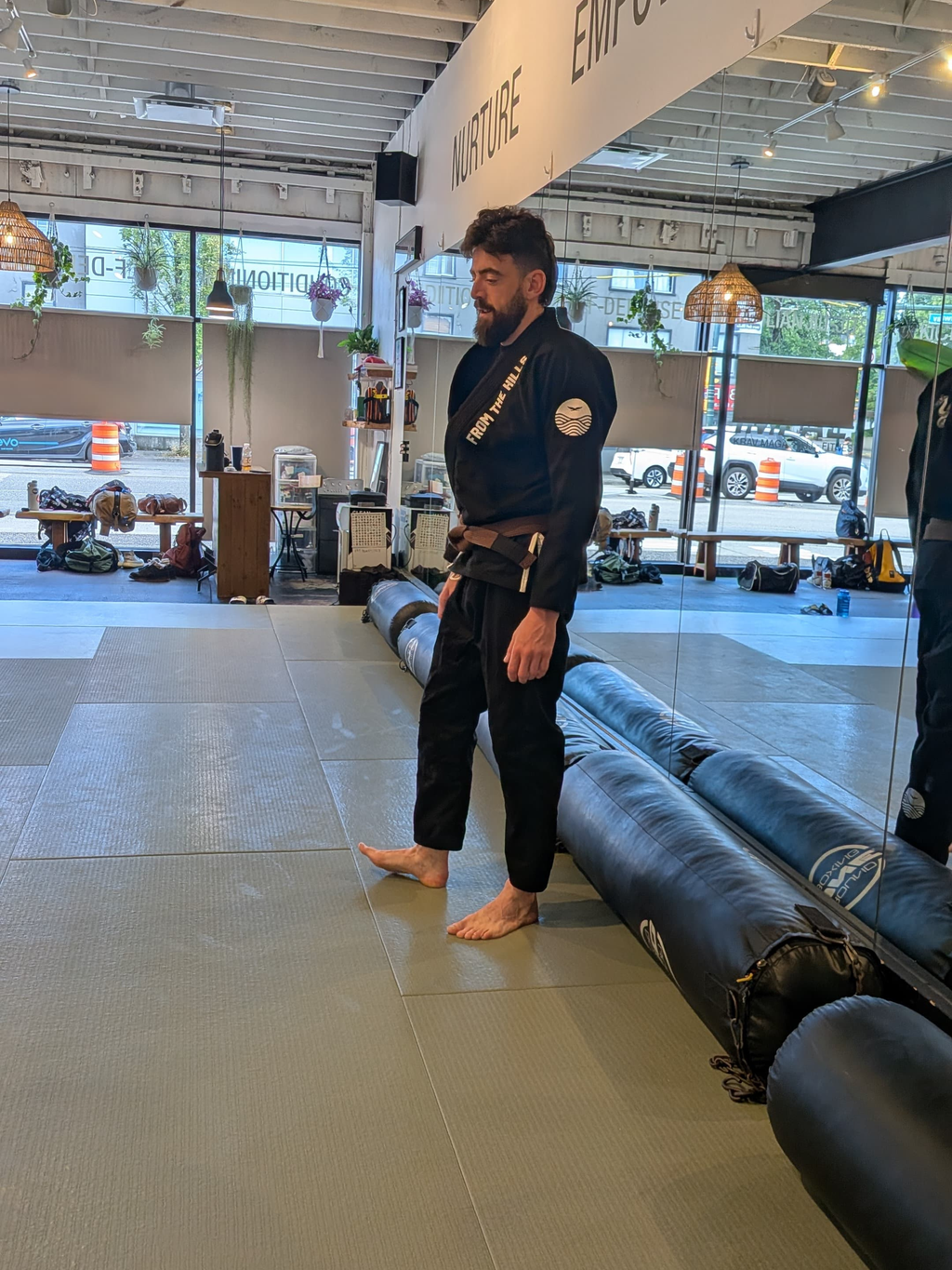 Shinsei Gi from From The Hills Jiu Jitsu by Gentle Art Collective, white martial arts gi with logo patches and reinforced stitching.