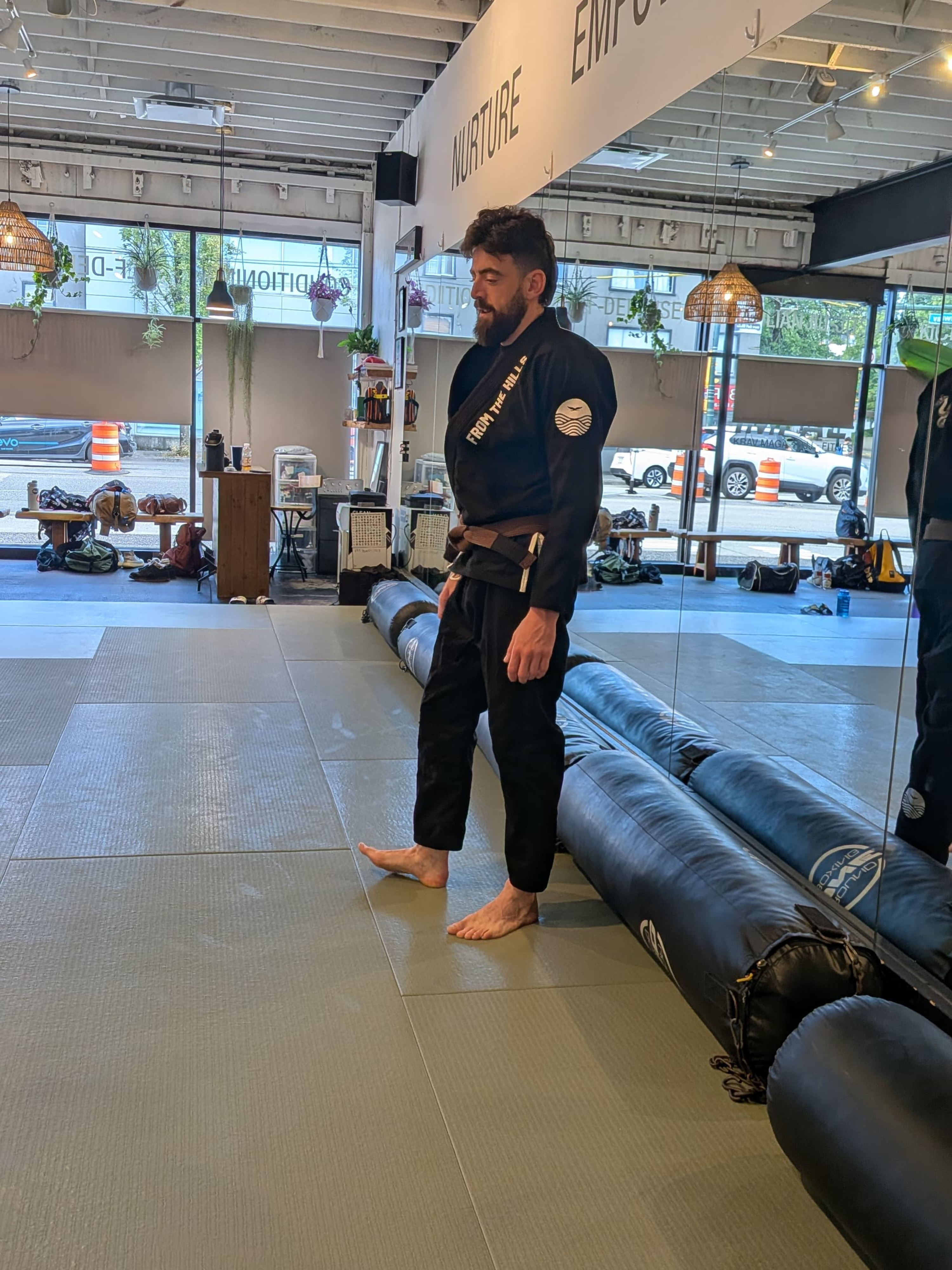 Shinsei Gi from From The Hills Jiu Jitsu by Gentle Art Collective, white martial arts gi with logo patches and reinforced stitching.