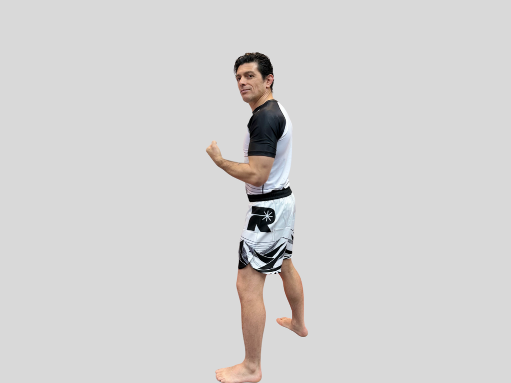 Gentle Art Collective rash guard featuring Summit - Gentle Art Collective x Resident Jiu Jitsu branding, fitted and designed for training.