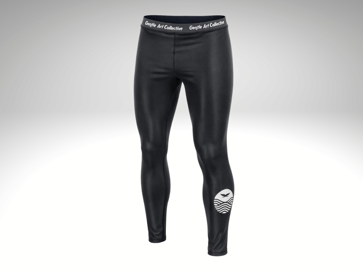 Black CORE Spats Rash Guard by Gentle Art Collective, showcasing stretchy fabric and sleek design perfect for activewear.
